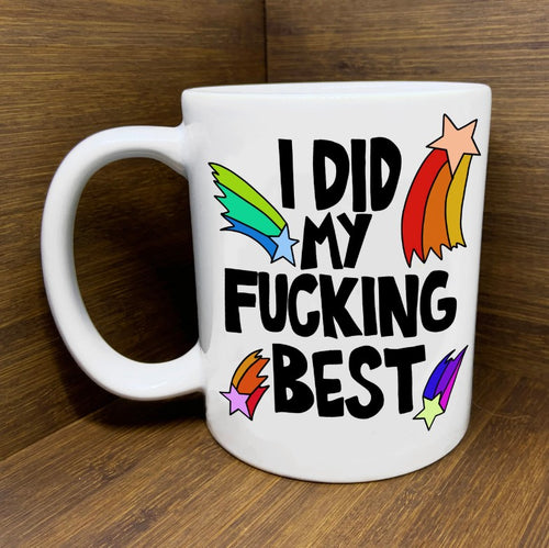 White Mug with colorful shooting star illustrations and the words 