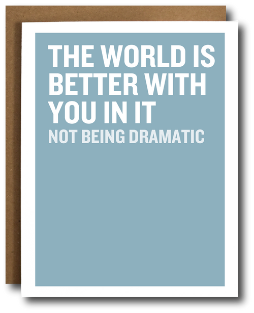 A greeting card with a light blue background and bold white text reading 'THE WORLD IS BETTER WITH YOU IN IT NOT BEING DRAMATIC,' shown with a brown kraft envelope behind it on a white background.
