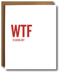 Funny millennial-themed political greeting card with bold red text reading 'WTF is going on?' on a minimalist white background. Ideal for expressing confusion over current events, politics, or the state of the world. Kraft envelope partially visible.