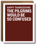 A Thanksgiving greeting card with a dark red background and bold white text reading 'HAPPY THANKSGIVING THE PILGRIMS WOULD BE SO CONFUSED,' shown with a brown envelope behind it on a white background.