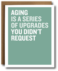 Card with humorous text 'Aging is a series of upgrades you didn't request' on a teal background