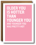 Pink greeting card with bold white text reading "Older you is hotter than younger you, and younger you was pretty hot"