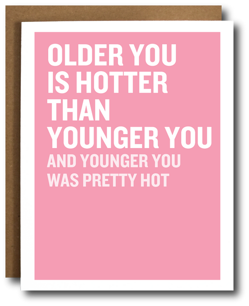 Pink greeting card with bold white text reading "Older you is hotter than younger you, and younger you was pretty hot"
