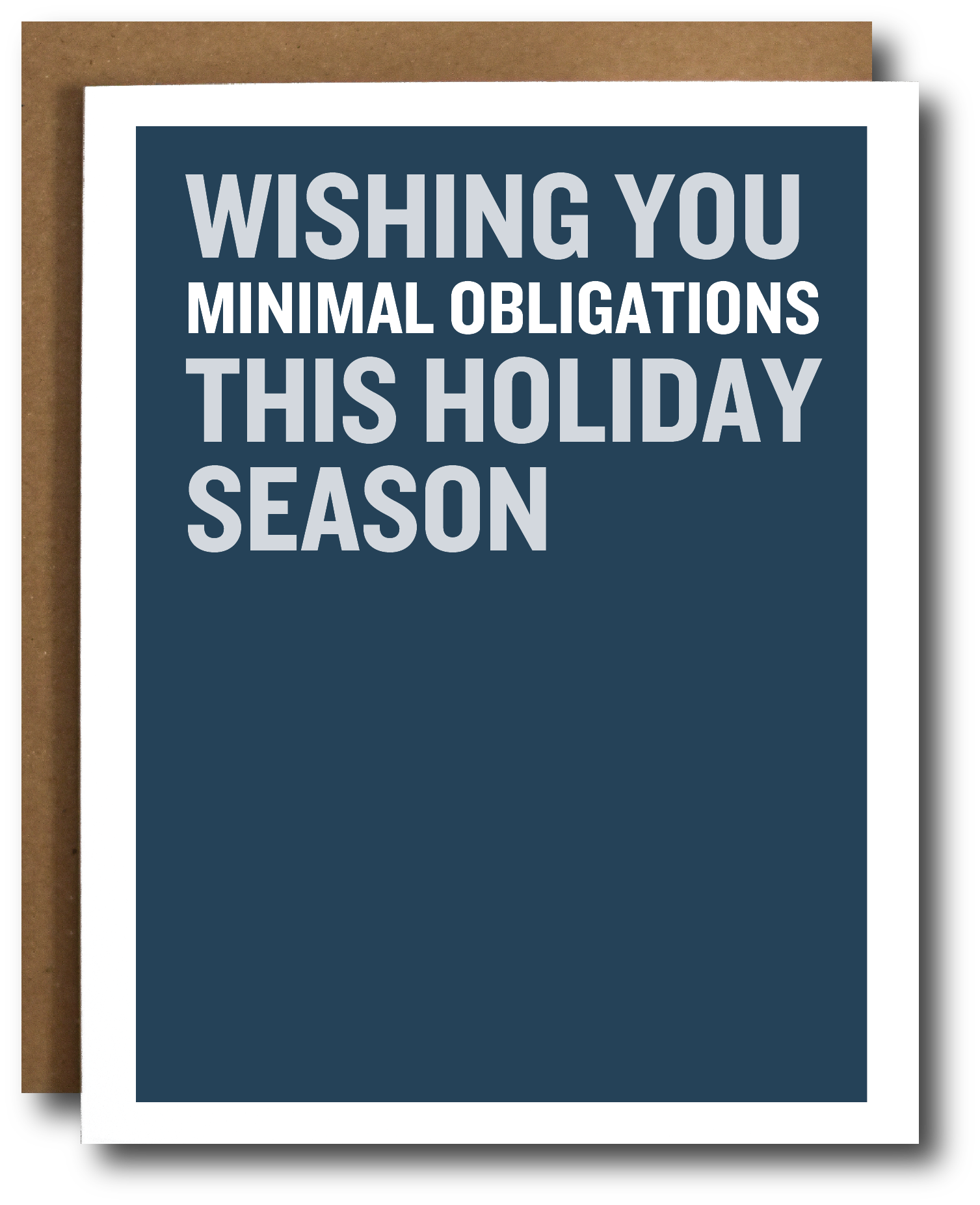 A greeting card with a dark blue front and bold white text reading 'WISHING YOU MINIMAL OBLIGATIONS THIS HOLIDAY SEASON,' shown with a brown kraft envelope behind it on a white background.