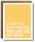 Greeting card with 'I love you even though you love the cat more' text on a yellow background