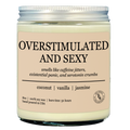 Candle jar labeled 'Overstimulated and Sexy' with description on a tan background