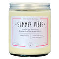 Photo of Summer Vibes 8ounce 50 hour soy wax candle in glass jar with tin lid. Tagline reads Smells like sunshine... and sand in all the wrong places. scent is ocean breeze